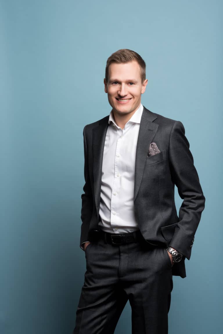 Man in a suit standing
