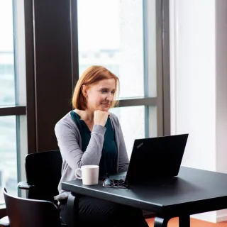woman with laptop and coffee