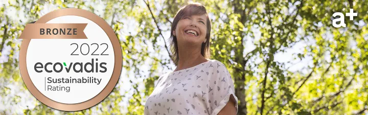 Woman smiling and EcoVadis logo