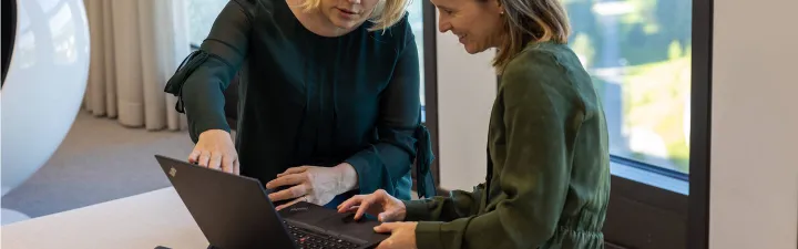 Two women sitting casual meeting