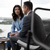 Lady and gentleman sitting and talking